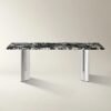 Dining table with black marble top and stainless steel base