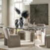 Dining table with black marble top and stainless steel base