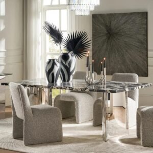 Dining table with black marble top and stainless steel base