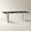 Dining table with black marble top and stainless steel base